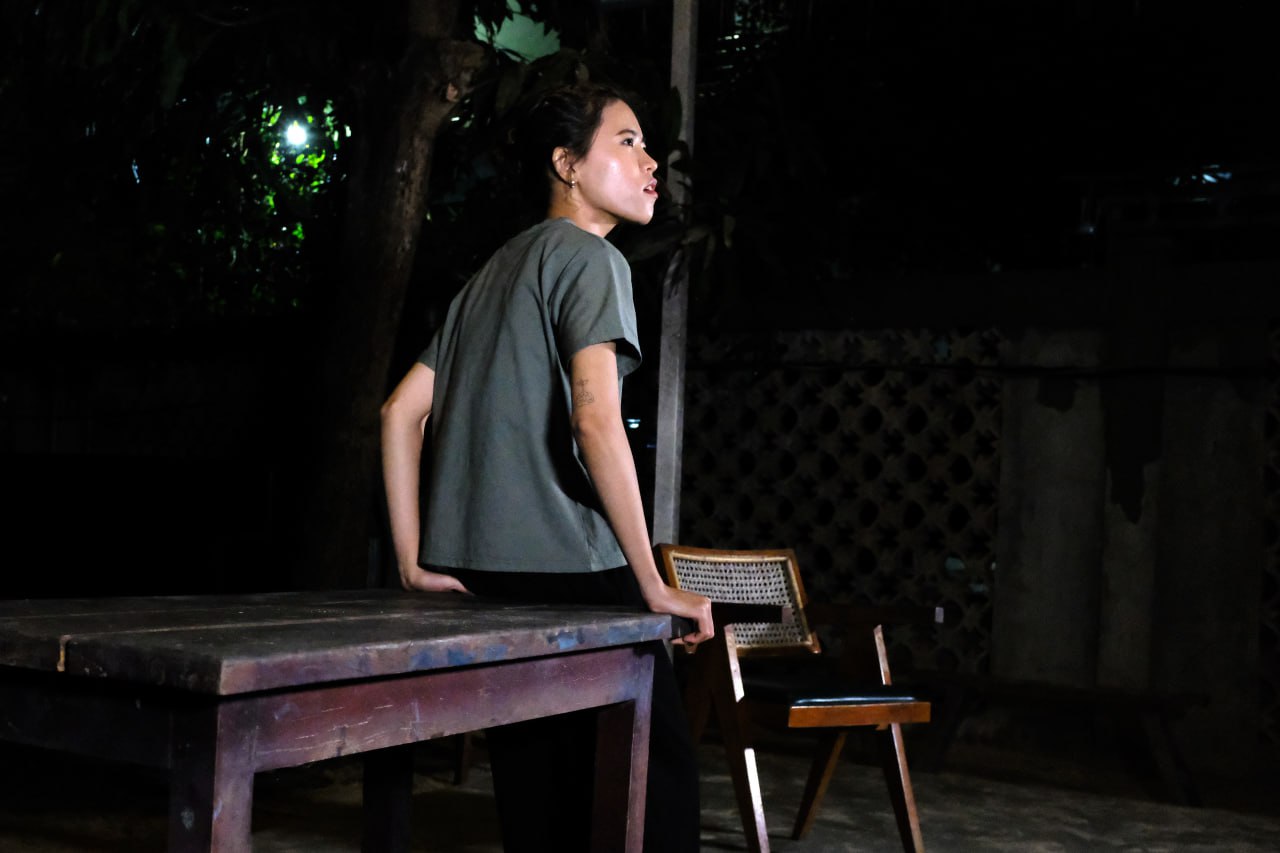 Solo performer at table